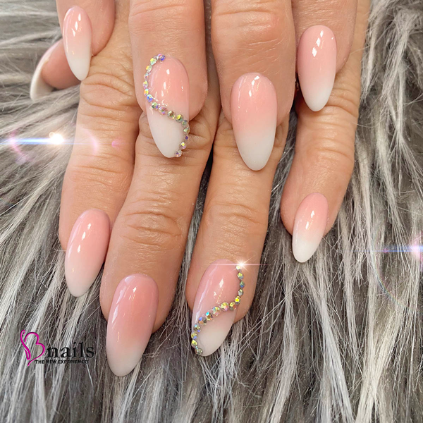 Client enjoying a pampering manicure experience close to home