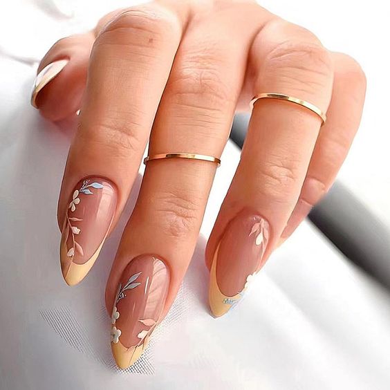 Fresh botanical nails with nature-inspired patterns at Bnails