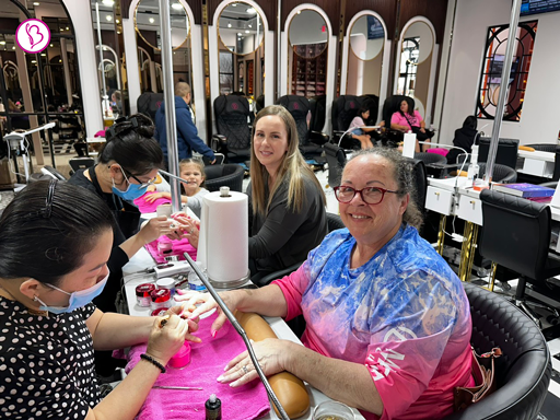 happy customer getting dip nail done at Bnails