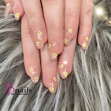 Nail artist at Bnails Lubbock creating a custom, hand-painted nail design