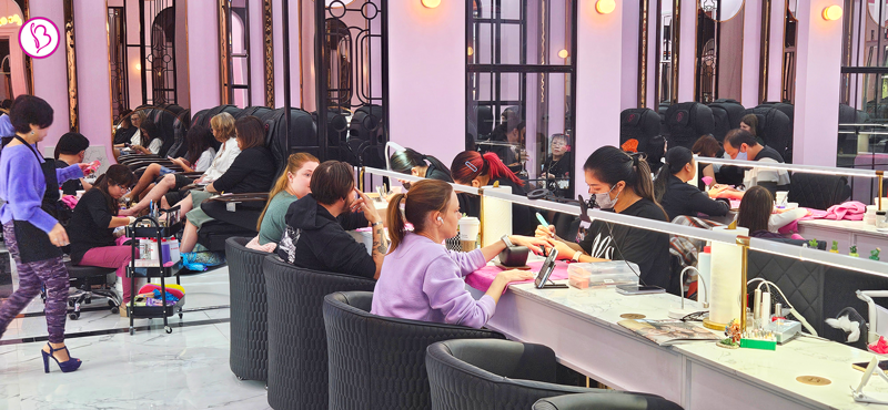 Customer enjoying a relaxing pedicure service at a clean and modern Cedar Park nail salon.