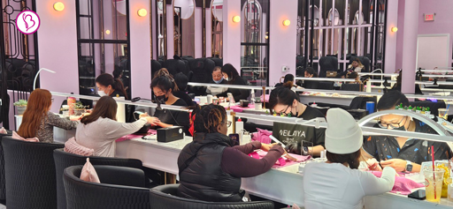 Skilled nail technician applying flawless dip nails at Cedar Park salon
